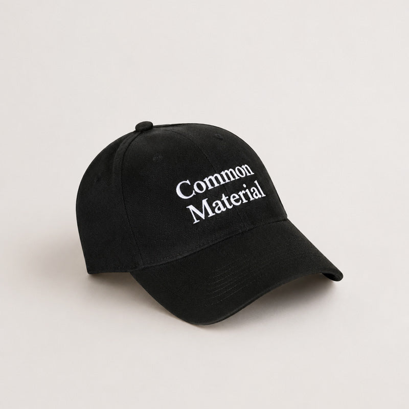 black cap with white text