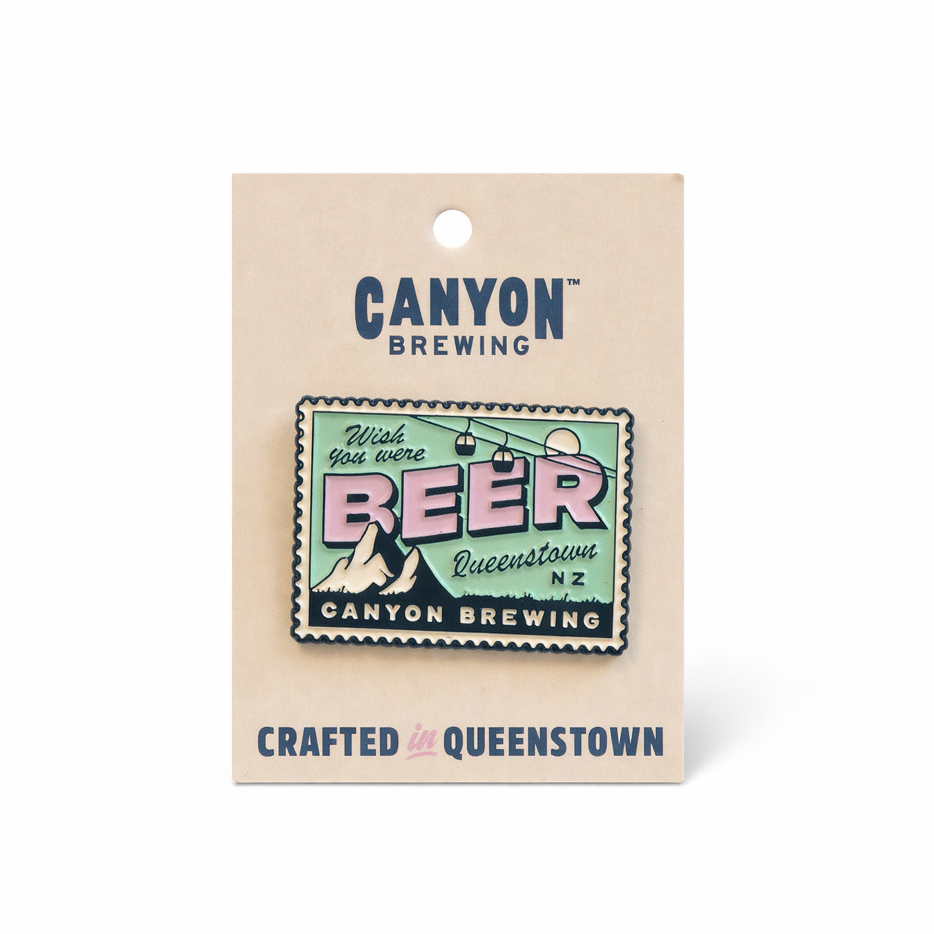 Greena nd pink pin on a piece of card