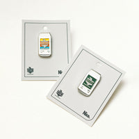 Two small beer cans on card backing