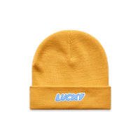 Yellow beanie with blue artwork on cuff