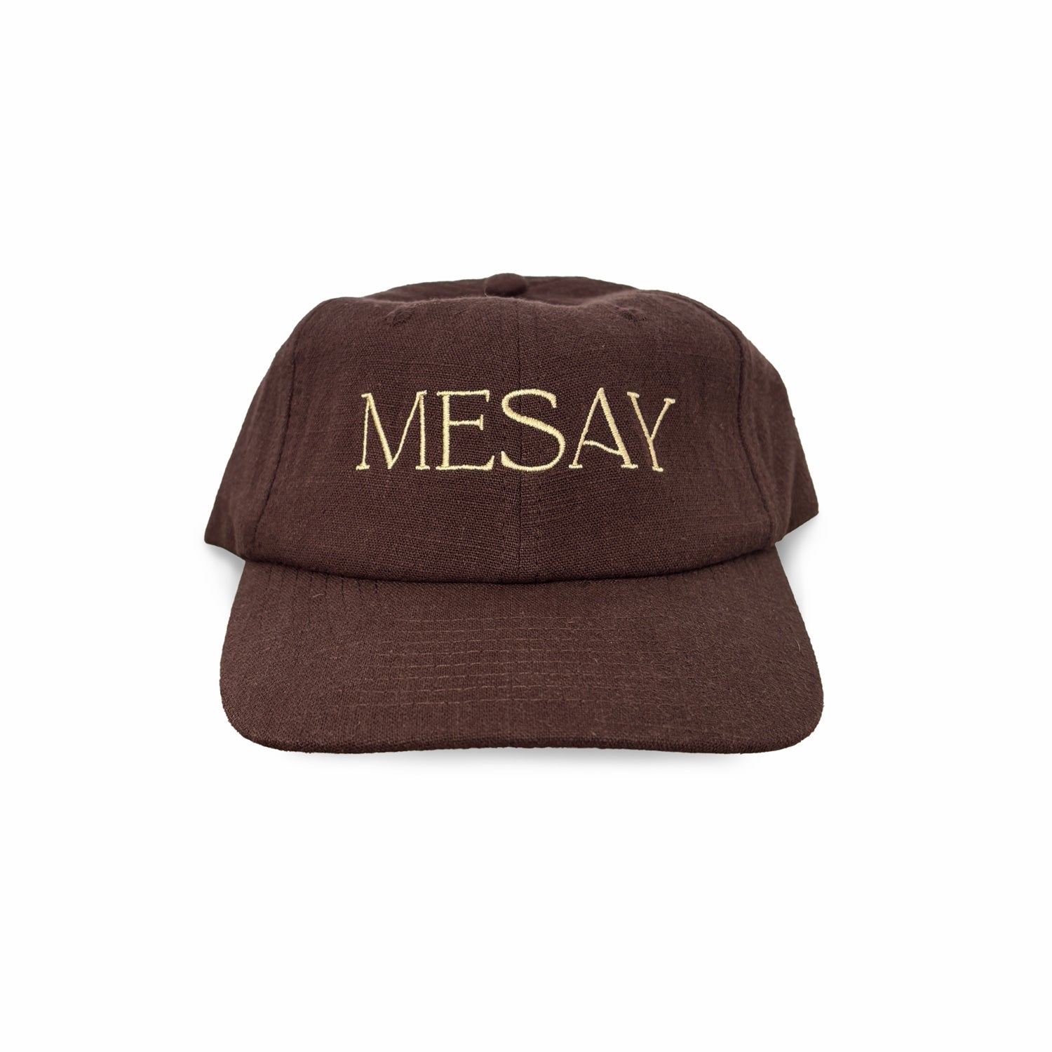 Brown cap with gold text written on front